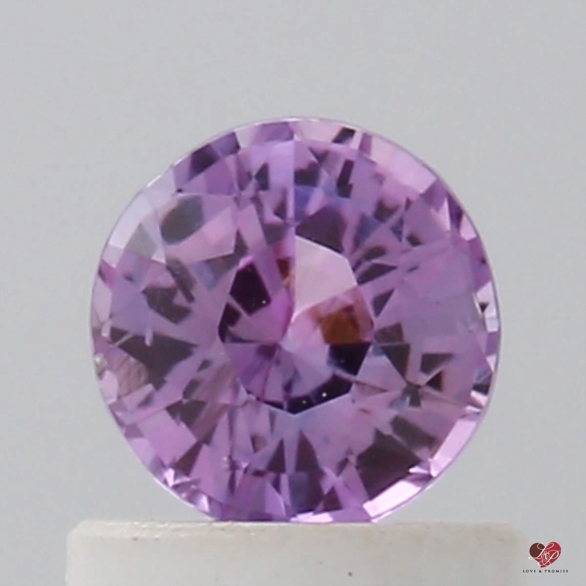 0.76cts Round Rose Berry Wine Sapphire