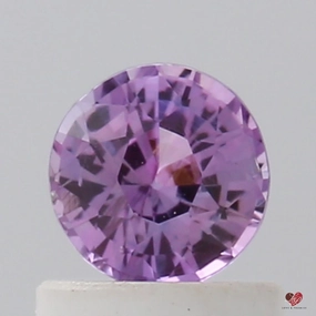 0.76cts Round Rose Berry Wine Sapphire