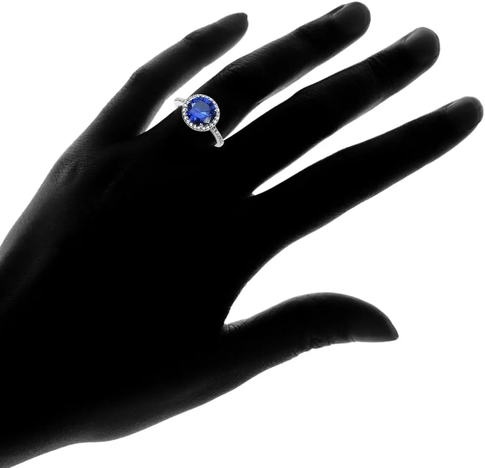 Ice Gems Sterling Silver Simulated Blue Sapphire and Cubic Zirconia Round Halo Ring