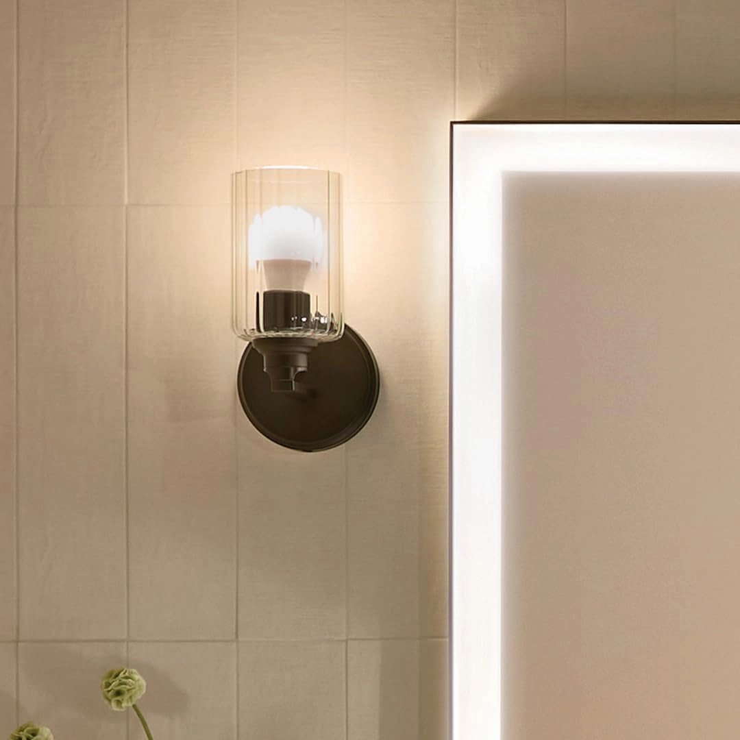 Kichler Gioe 5" 1-Light Wall Sconce with Clear Fluted Glass in Black, Damp Rated, for Powder Room, Kitchen, Hallway, Bedroom, Fireplace, (5" W x 9.5" H), 55224BKFLU